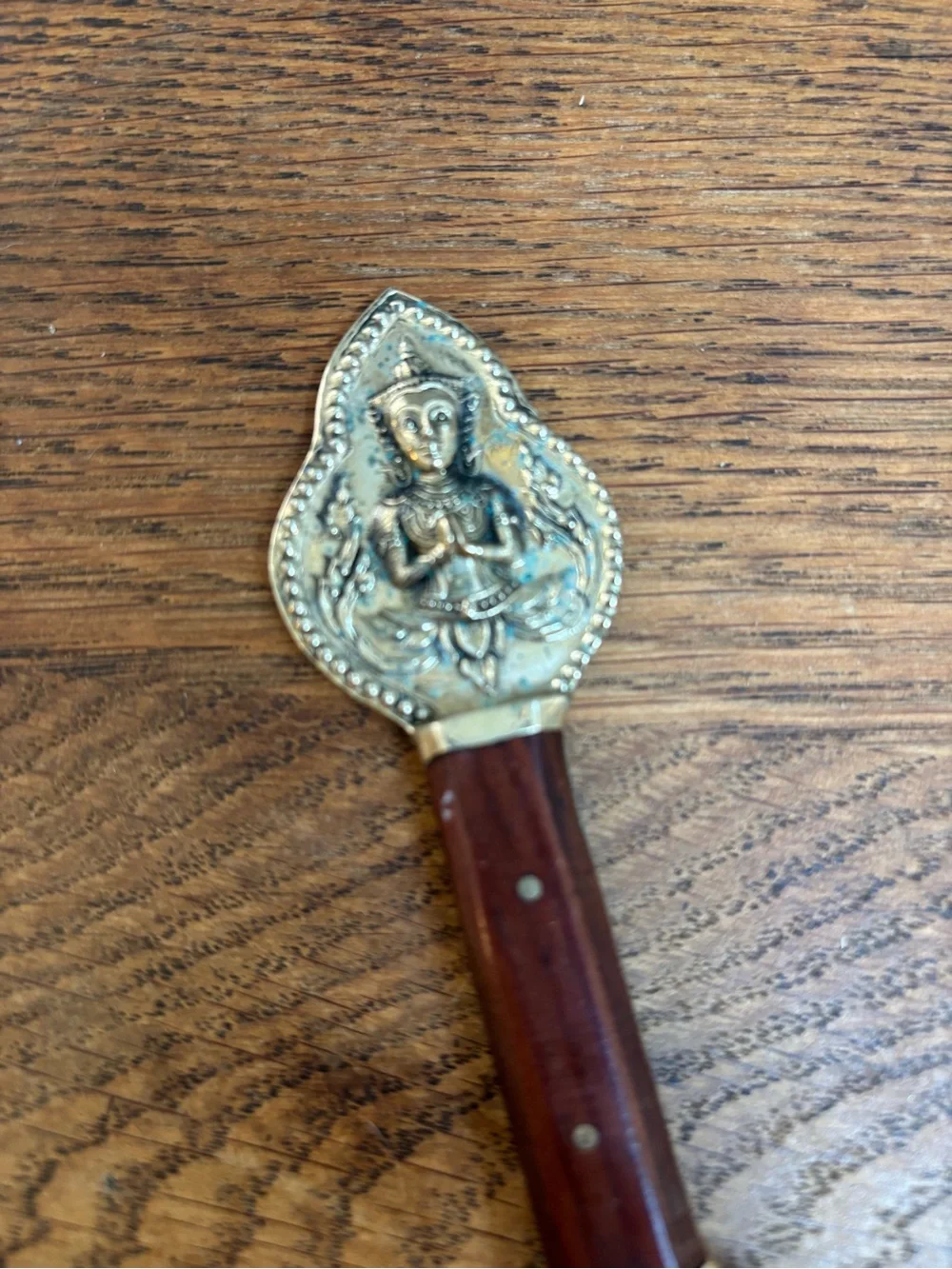 Vintage Brass and Wood Bottle Opener. Bottle Embossed Hindu Deity Design.